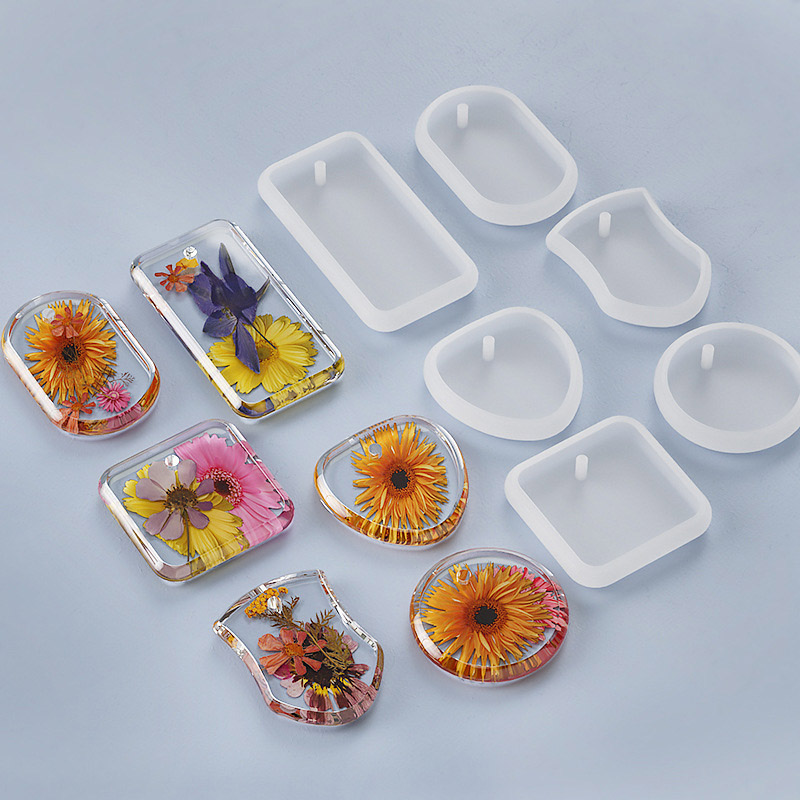 Use a resin silicone mold to create a resin memorial pendant for dried flowers